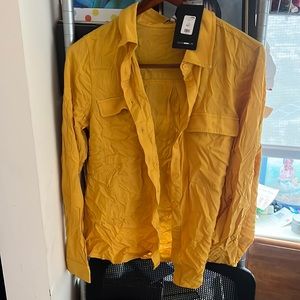 Brand new gold long sleeve blouse